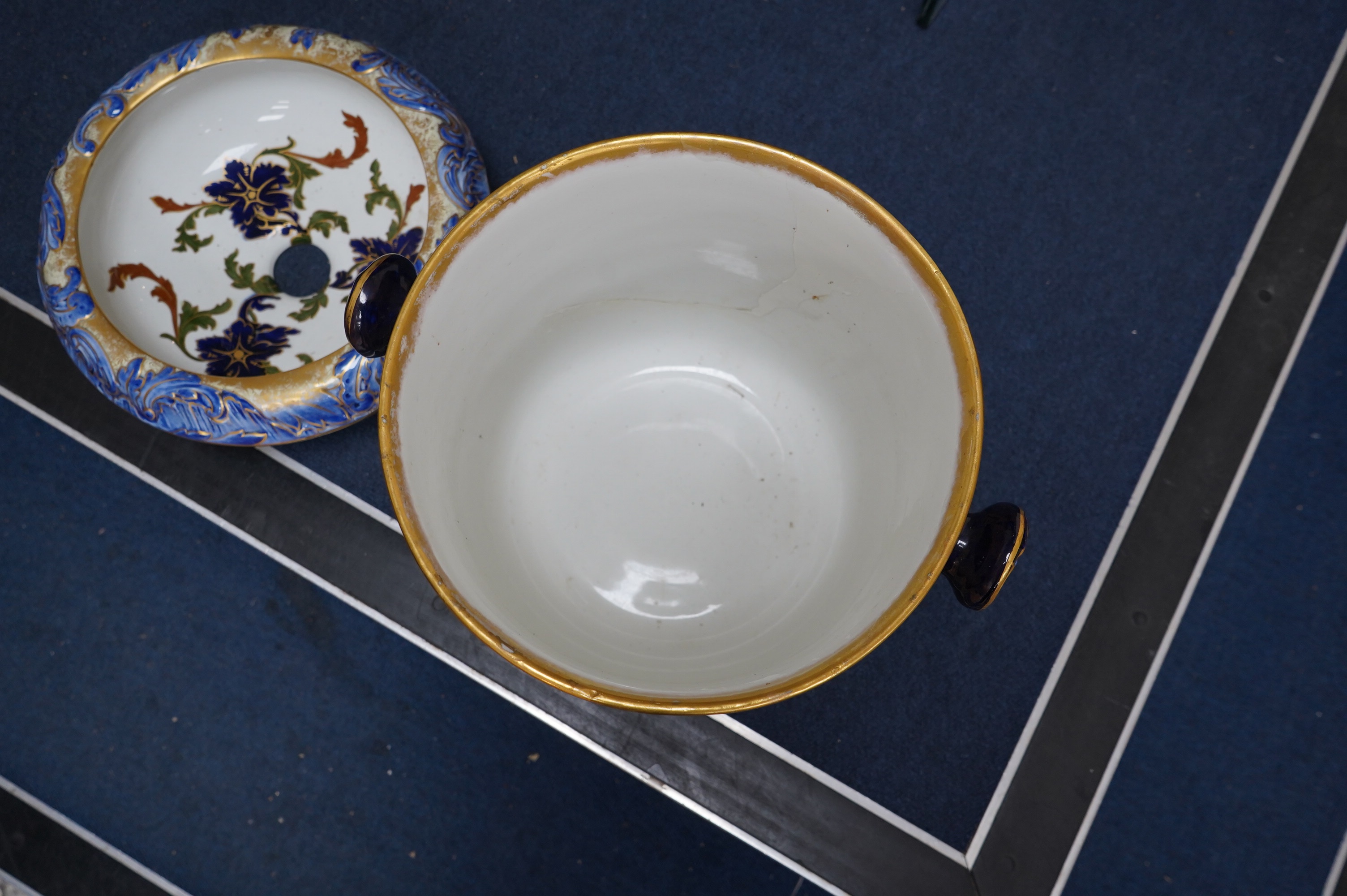 A Victorian Royal Doulton gilt and floral decorated pail, 28cm high. Condition - poor, crack to back